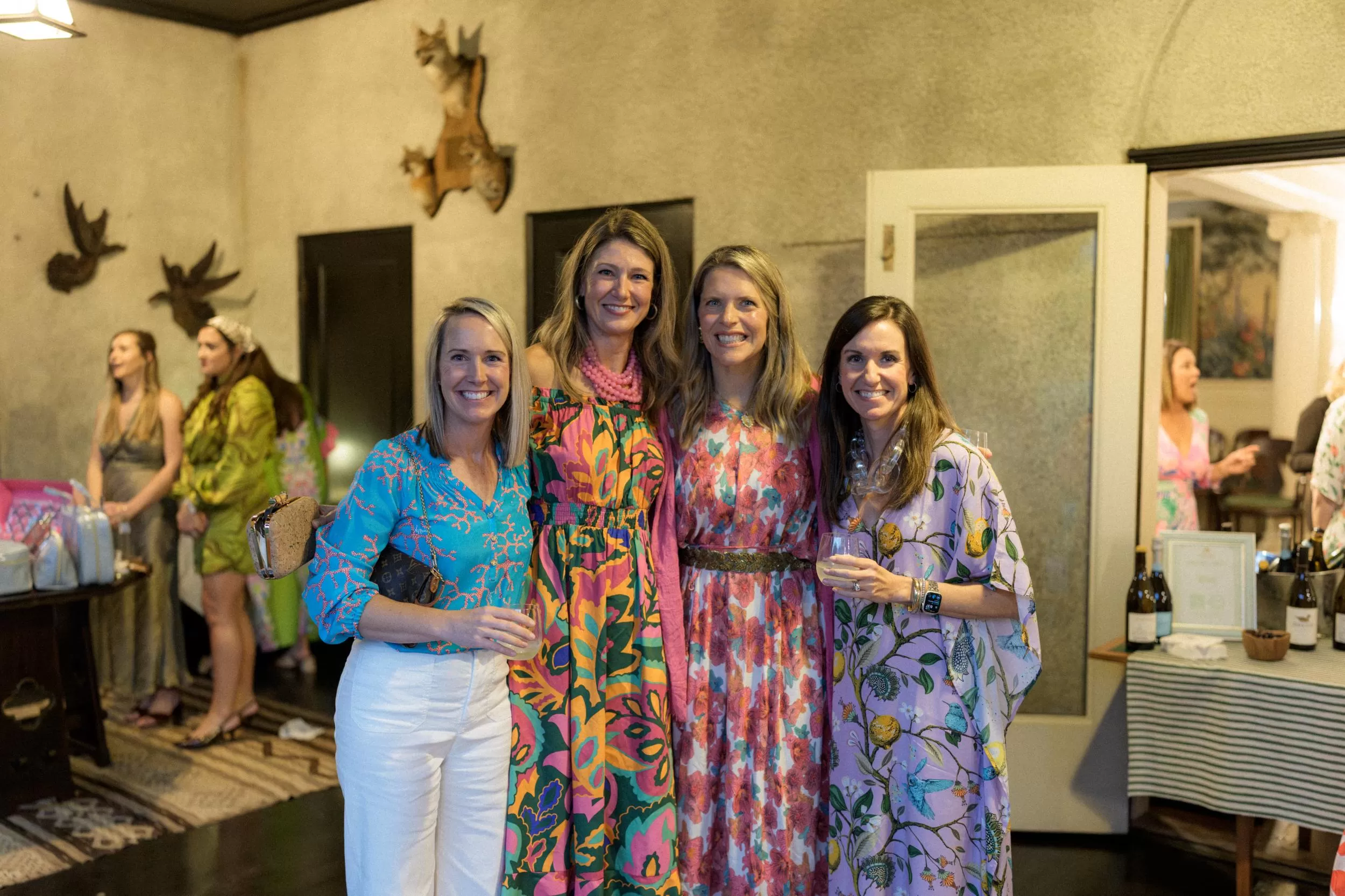 group of women smiling for a photo