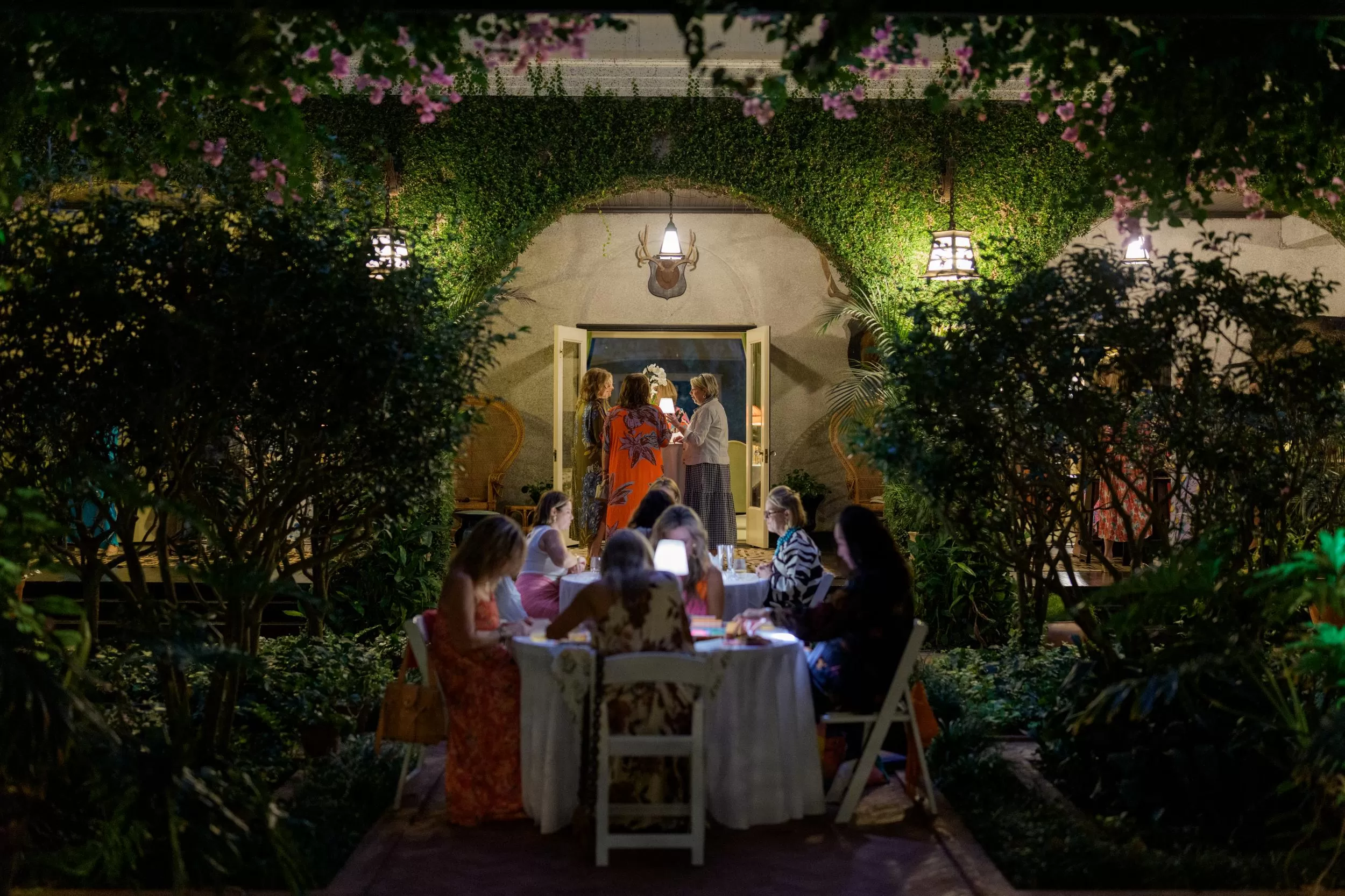 outdoor evening view of women mingling